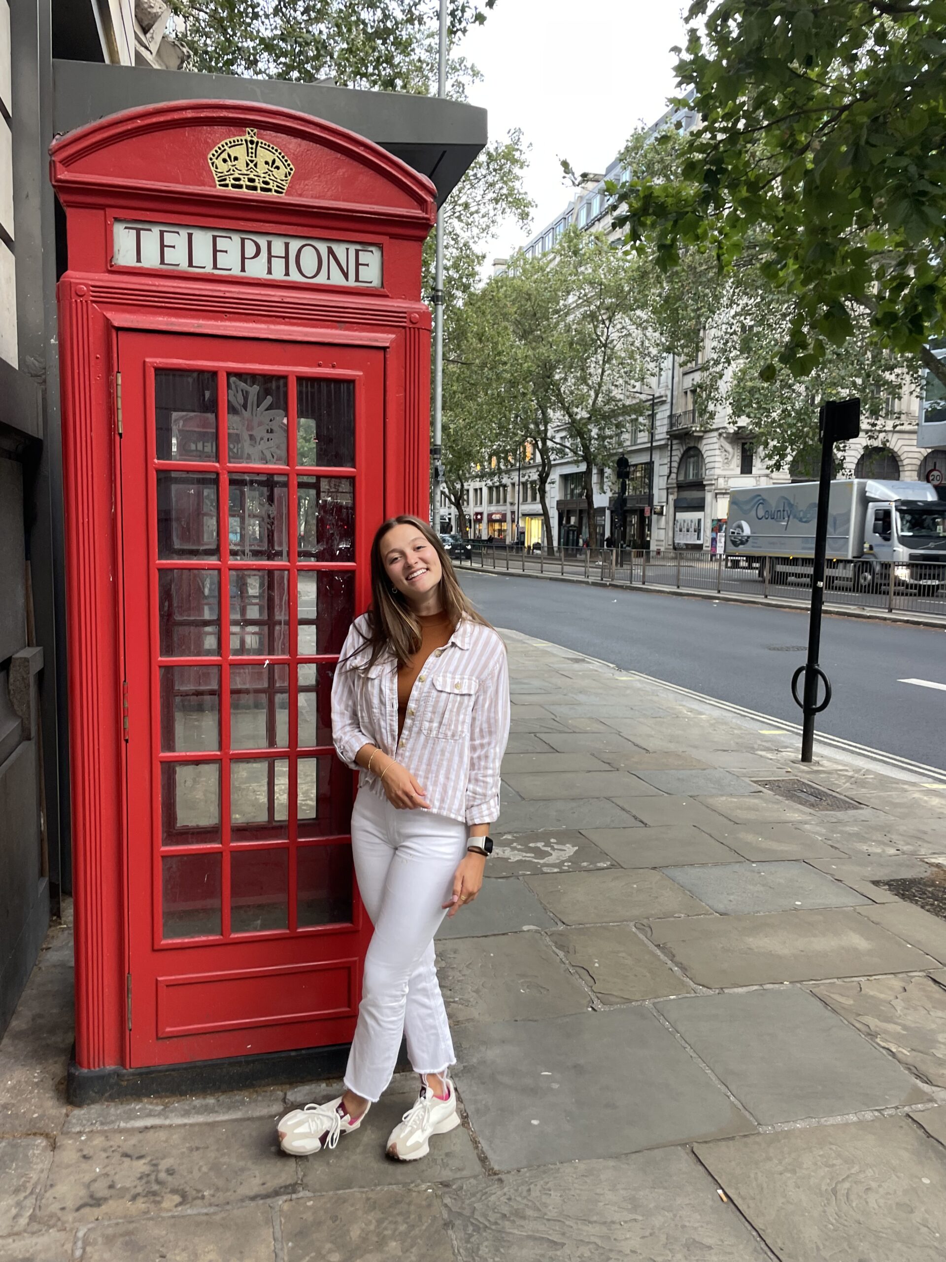 Photo of me in front a telephone booth in London